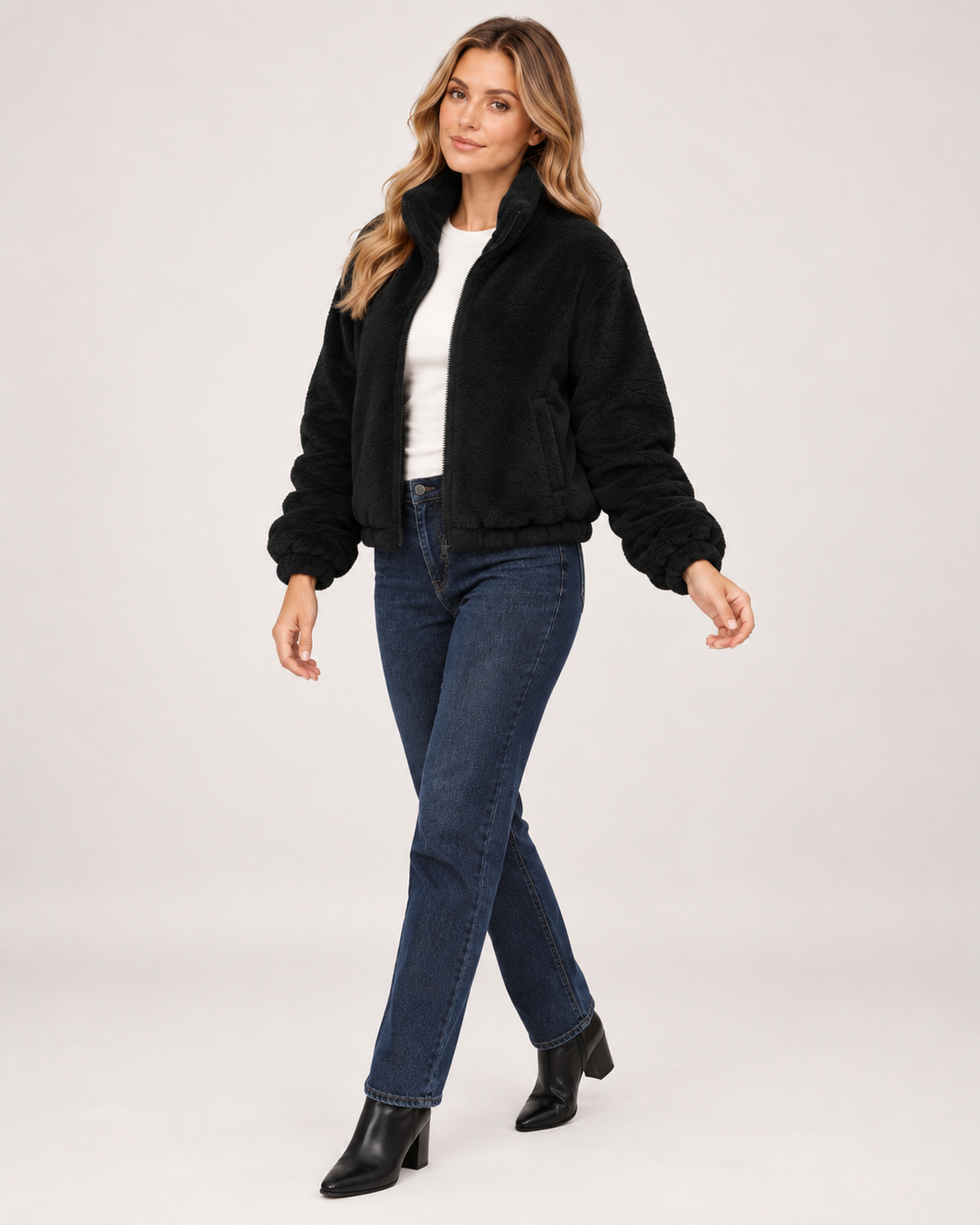 Women’s Fleece Jacket with Funnel Neck and Zip Front in Black, three quarter body view
