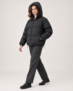 Women’s Puffer Jacket with Hood and Drawcord Hem in Black, three quarter body view