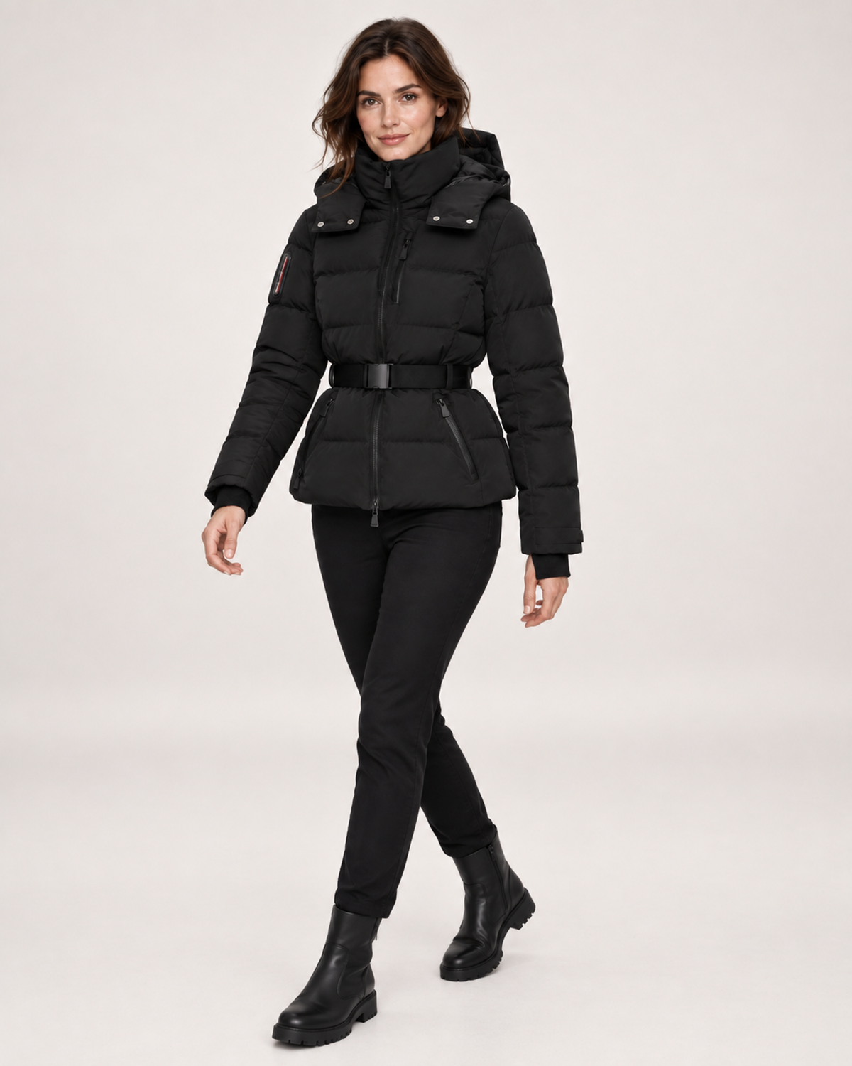 Women’s Ski Jacket in Black with Belt and Hood in Black, three quarter body view