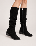 Women’s Knee High Boots with Low Heel and Side Zip in Black, worn footwear focus below knee view