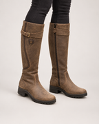 Women’s Riding Boots with Buckle Detail and Low Heel in Brown, worn footwear focus below knee view