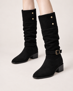 Women’s Knee High Boots with Slouch Shaft and Block Heel in Black, worn footwear focus below knee view