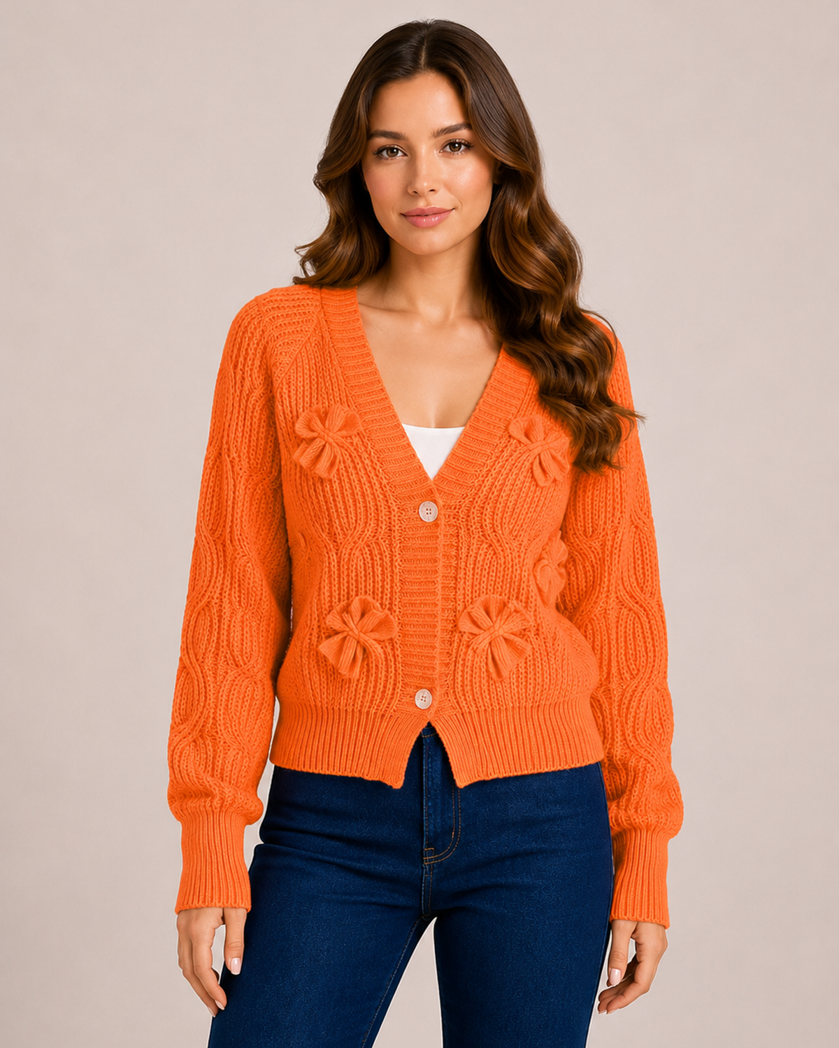 Women’s orange bow cardigan front view