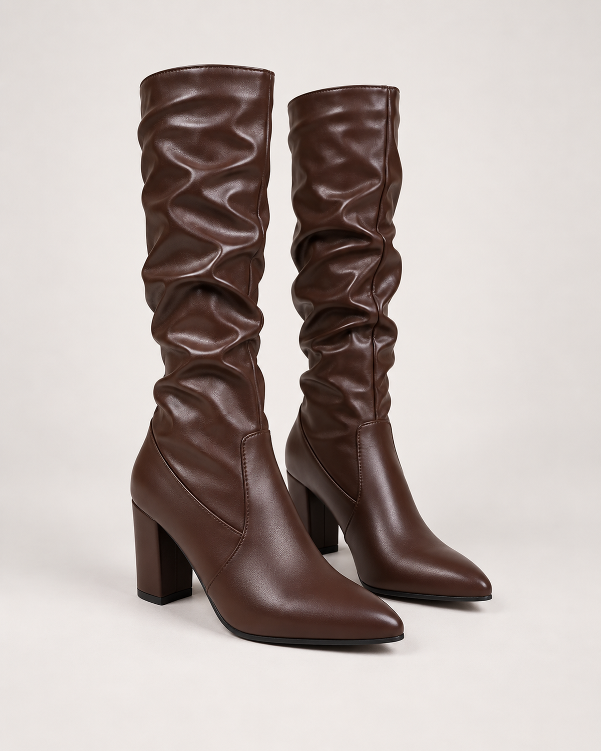 Women’s Knee High Boots with Pointed Toe and High Heel in Brown, product only pair front three quarter view
