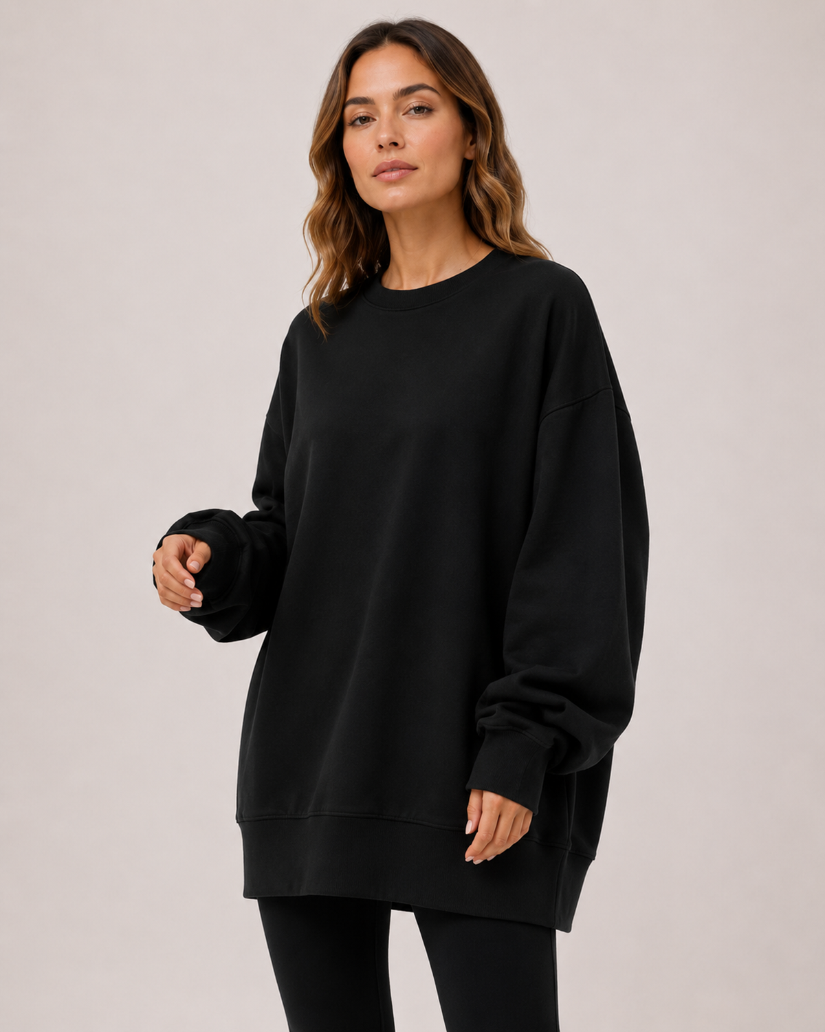 Women’s Oversized Sweatshirt with Crew Neck in Black, three quarter body view