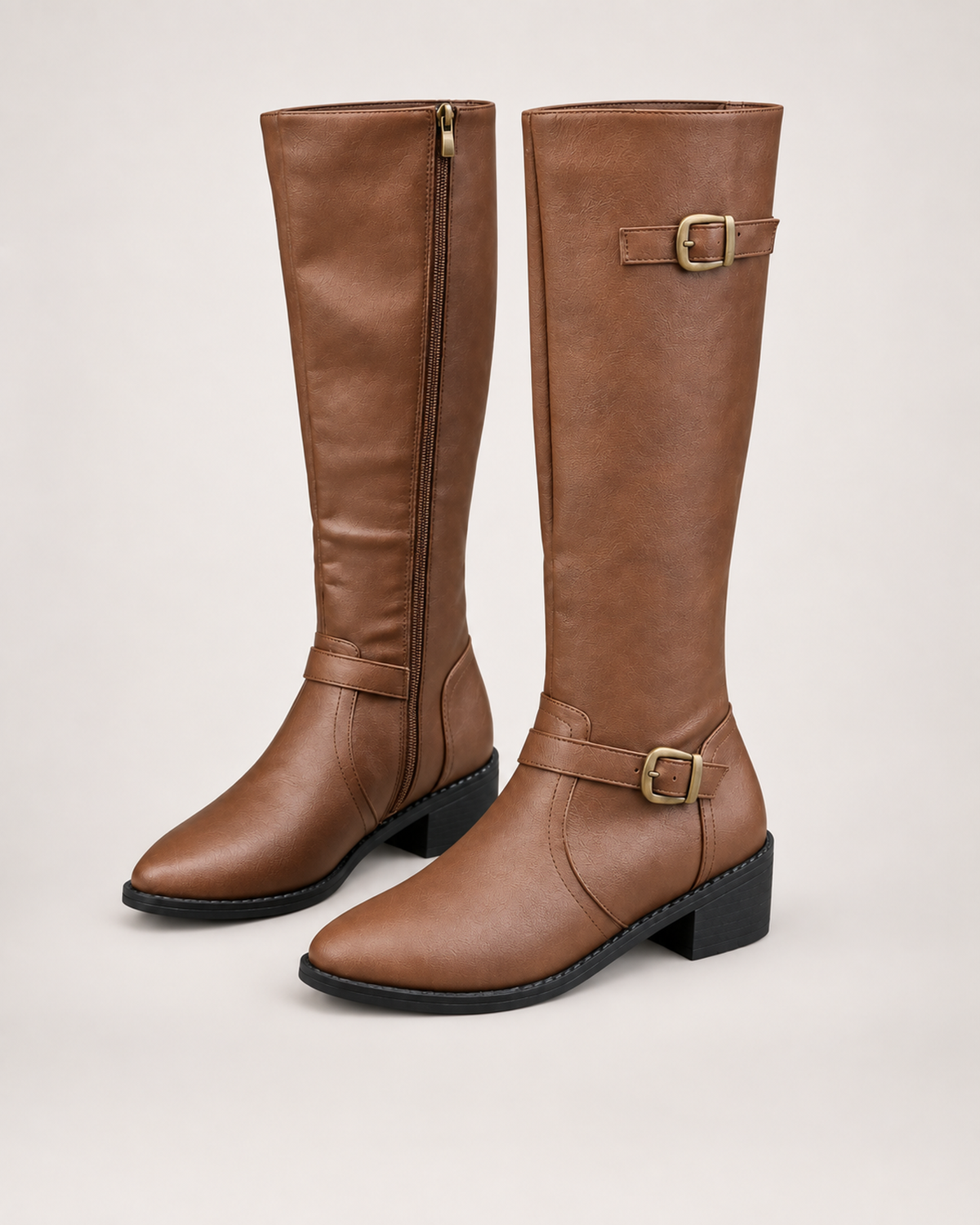 Women’s Knee High Boots with Riding Shape and Buckle Detail in Brown, product only pair front three quarter view