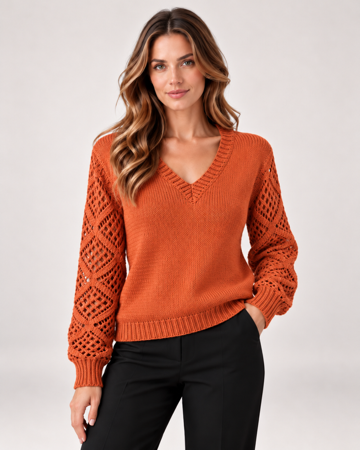 Women's orange V neck jumper with openwork sleeves